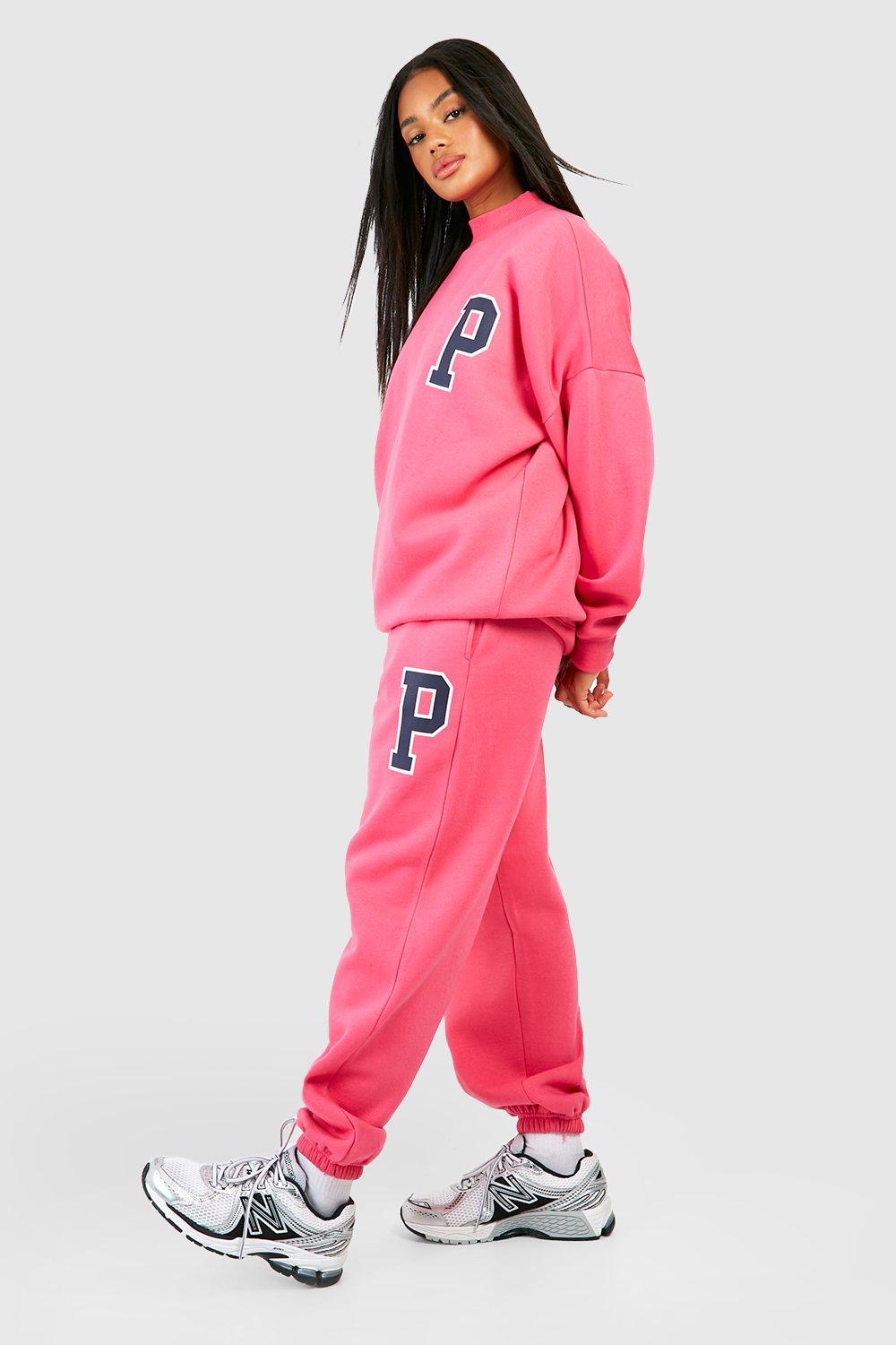 Pink best sale champion tracksuit